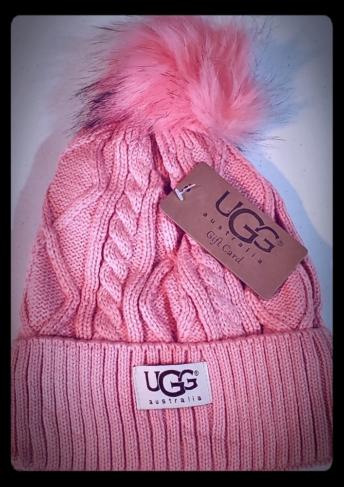 UGG Australia fleece lined winter hat. Color is closer to Salmon than pink